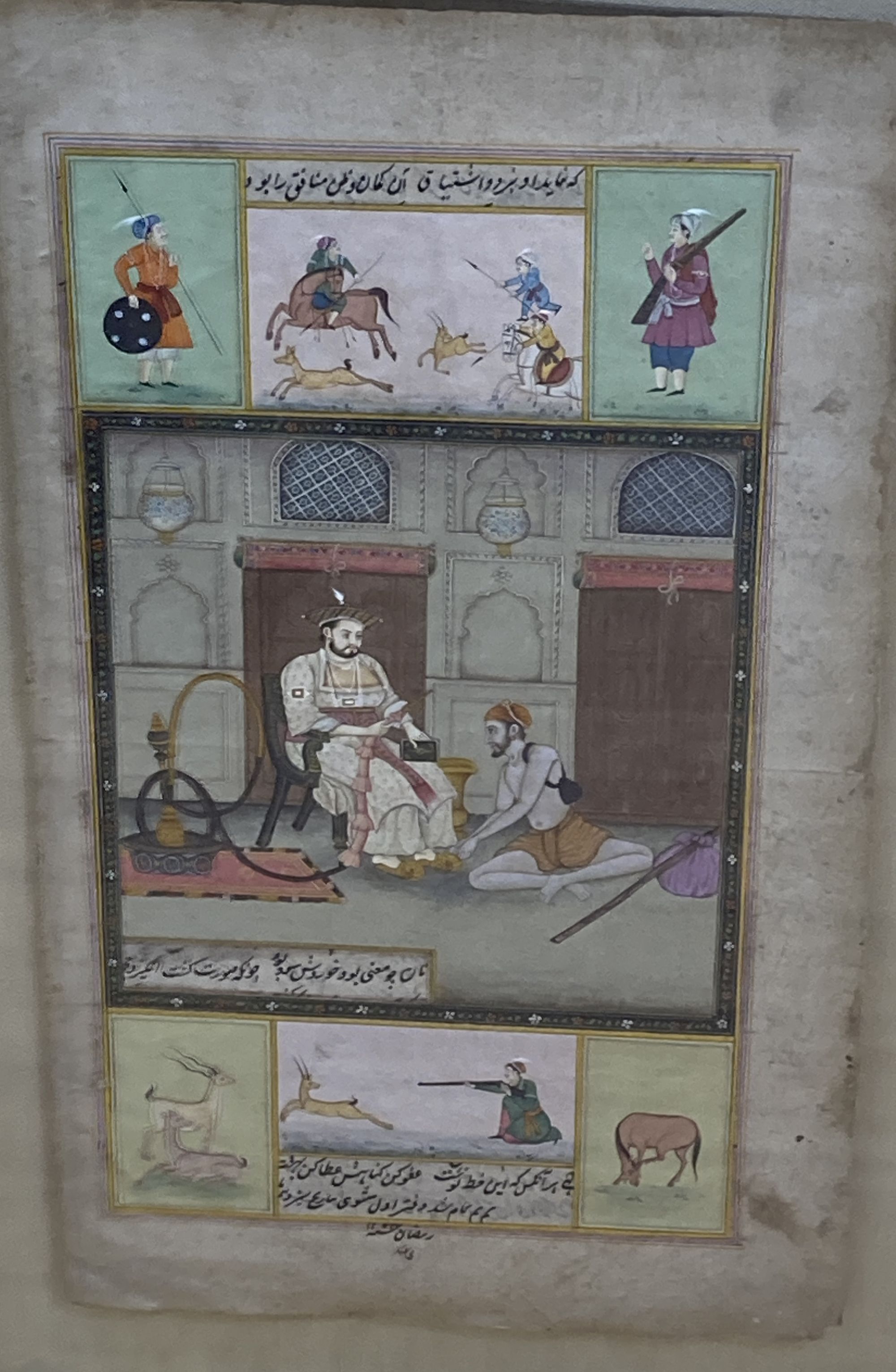 A set of three Indian miniature paintings, Mughal style, on inscribed pages, Interiors with noblemen, overall 34.5 x 20cm and 20 x 34.5